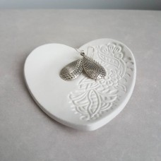 White clay heart shaped trinket dish with henna style design