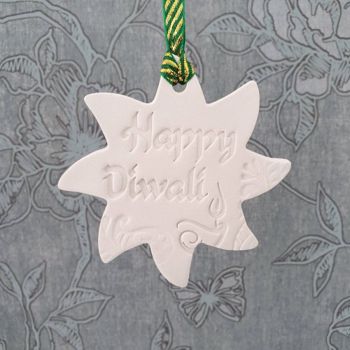 Sun or firework shaped Diwali clay decoration