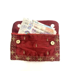 Red wallet, makeup bag, jewellery bag. 