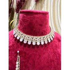 Seema Reverse Ad Set in Dusty Pink and Grey Color comes with Stud earrings and Tika.