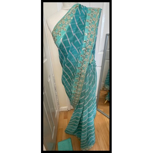 Georgette Lairya print saree 936 ( saree is 5 and 1/2 yards it is NOT 6 yards the bottom border starts at 45 inch